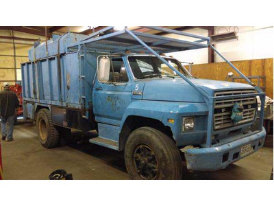 Ford F700 dump truck AND Morbark Chipper