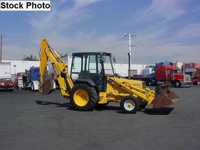 1990 New Holland 655C Backhoe w/ Trailer