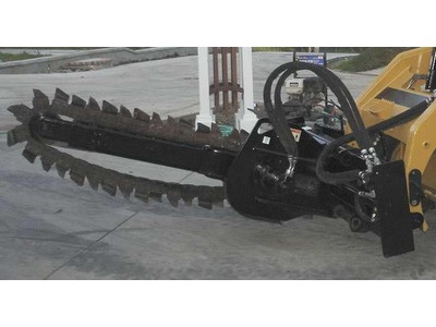 Barely used trencher fits cat skid steer