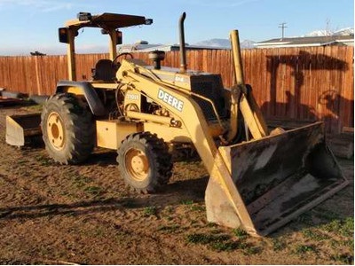 1999 John Deere Skip Loader 210LE 