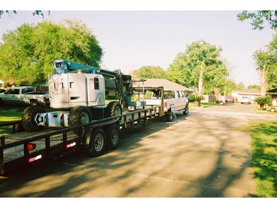1999 genie manlift and 30 trailer