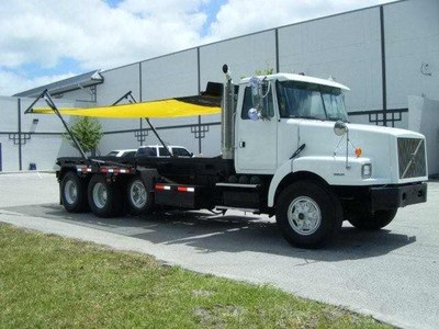 1998 Volvo WG64 Roll Off Truck for sale