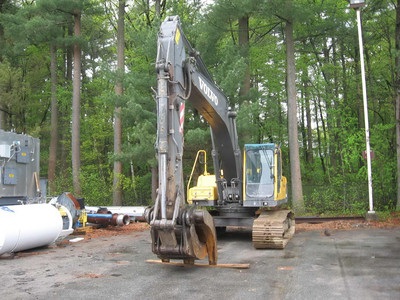 Volvo excavator with grapple