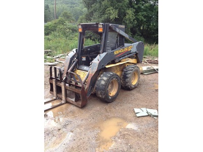 03 New Holland LS180